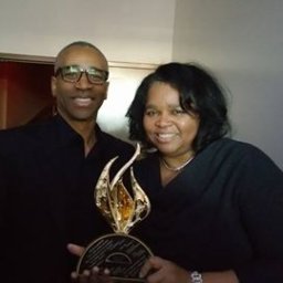Praise 104.7FM just won the Stellar Award for the Medium Market Radio! Congratulating me is Jerry Smith.jpg