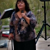 CINDY SINGING 2016 PINE VALLEY AMPITHEATER.jpg