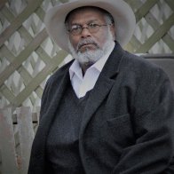 Puckett on bench (2).JPG